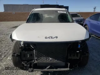 2024 Kia EV9 Wind z VIN KNDAFFS59R6030316, wystawiony jako Copart lot #87417224 z przebiegiem 10 654 mil mil oraz Szkoda całkowita • Salvage title. Historia ofert i sprzedaży dostępna na DreamBid. Obrazek 5.