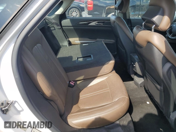 2013 Lincoln MKZ z VIN 3LN6L2G98DR804632, wystawiony jako Copart lot #56985055 z przebiegiem 128 509 mil mil oraz Szkoda całkowita • Salvage title. Historia ofert i sprzedaży dostępna na DreamBid. Obrazek 10.