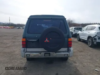 1995 Mitsubishi Montero z VIN JA4MR41H7SJ010597, wystawiony jako IAAI lot #41610885 z przebiegiem 162 406 mil mil oraz . Historia ofert i sprzedaży dostępna na DreamBid. Obrazek 16.