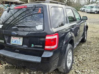 2011 Ford Escape Hybrid с VIN 1FMCU5K36BKB54964, выставлен на аукционе Copart как лот 82873554 с пробегом Не указан миль и Списание • Salvage title. История ставок и продаж доступна на DreamBid. Изображение 3.