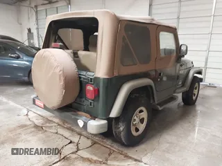 2003 Jeep Wrangler X z VIN 1J4FA39S43P339234, wystawiony jako IAAI lot #41329654 z przebiegiem 175 376 mil mil oraz . Historia ofert i sprzedaży dostępna na DreamBid. Obrazek 4.