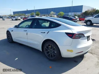 2022 Tesla Model 3 Long Range with VIN 5YJ3E1EB3NF179304, listed as a IAAI auction lot 42003380 with 46,759 mi miles. Bid and sale history available at carsss.com. Image 3.