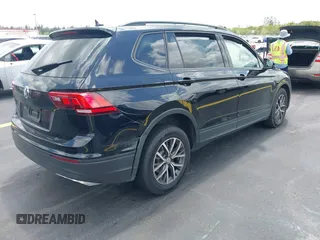 2021 Volkswagen Tiguan S z VIN 3VV1B7AX7MM116609, wystawiony jako IAAI lot #42206016 z przebiegiem 47 049 mil mil oraz . Historia ofert i sprzedaży dostępna na DreamBid. Obrazek 4.