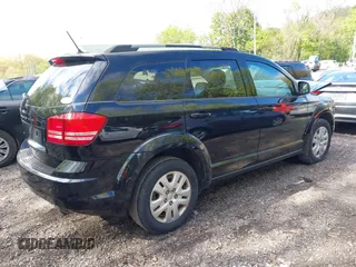 2017 Dodge Journey SE z VIN 3C4PDCAB6HT697631, wystawiony jako IAAI lot #42200146 z przebiegiem 158 511 mil mil oraz . Historia ofert i sprzedaży dostępna na DreamBid. Obrazek 4.