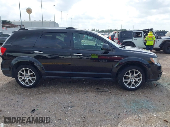 2012 Dodge Journey Crew с VIN 3C4PDCDGXCT200032, выставлен на аукционе IAAI как лот 42412809 с пробегом 154 423 миль миль и . История ставок и продаж доступна на DreamBid. Изображение 13.