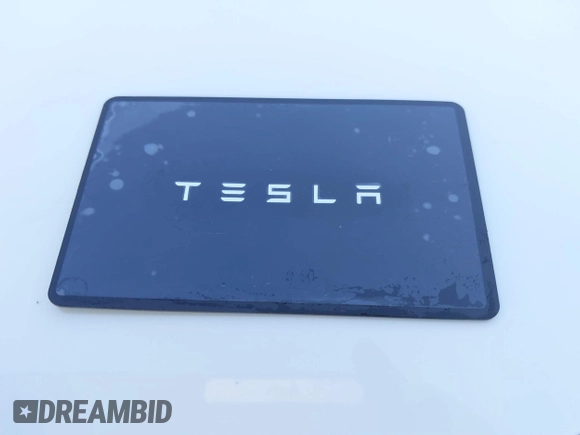 2023 Tesla Model 3 z VIN 5YJ3E1EA0PF611244, wystawiony jako IAAI lot #41455102 z przebiegiem 21 867 mil mil oraz . Historia ofert i sprzedaży dostępna na DreamBid. Obrazek 11.