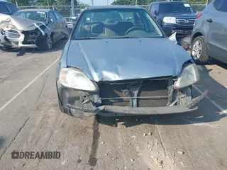 1999 Honda Civic LX z VIN 2HGEJ6670XH566953, wystawiony jako IAAI lot #42390891 z przebiegiem 290 417 mil mil oraz . Historia ofert i sprzedaży dostępna na DreamBid. Obrazek 6.