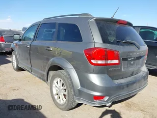 2013 Dodge Journey SXT with VIN 3C4PDCBG0DT502787, listed as a IAAI auction lot 41743639 with 54,823 mi miles. Bid and sale history available at carsss.com. Image 3.