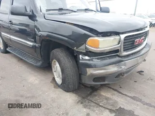 2004 GMC Yukon SLT with VIN 1GKEK13Z24J113954, listed as a IAAI auction lot 41950157 with 174,021 mi miles. Bid and sale history available at carsss.com. Image 6.