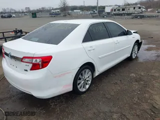 2014 Toyota Camry Hybrid LE with VIN 4T1BD1FK1EU102768, listed as a IAAI auction lot 41793746 with 157,015 mi miles. Bid and sale history available at carsss.com. Image 4.