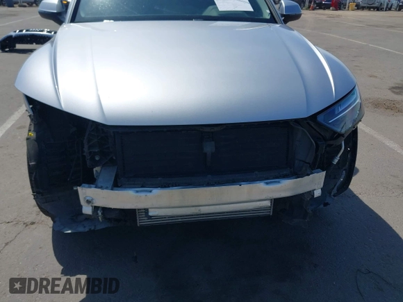 2021 Audi Q5 Premium Plus z VIN WA1BAAFY6M2130653, wystawiony jako IAAI lot #42138199 z przebiegiem 42 127 mil mil oraz . Historia ofert i sprzedaży dostępna na DreamBid. Obrazek 6.