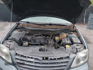 2005 Chrysler Pacifica z VIN 2C4GM48LX5R441804, wystawiony jako IAAI lot #39000062 z przebiegiem 161 186 mil mil oraz . Historia ofert i sprzedaży dostępna na DreamBid. Obrazek 10.