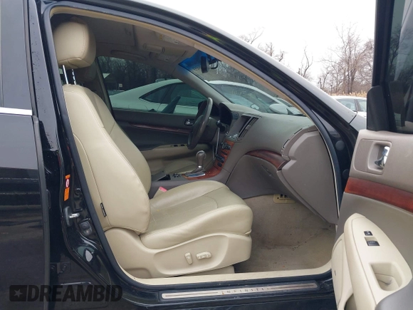 2009 Infiniti G37 x with VIN JNKCV61F99M359887, listed as a IAAI auction lot 41606853 with 123,404 mi miles. Bid and sale history available at carsss.com. Image 5.