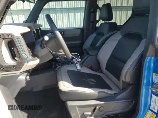 2023 Ford Bronco with VIN 1FMEE5DP7PLB92288, listed as a Copart auction lot 49272285 with 8,591 mi miles and Salvage Title. Bid and sale history available at DreamBid. Image 7.