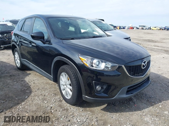 2014 Mazda CX-5 Touring with VIN JM3KE2CY9E0333951, listed as a IAAI auction lot 41825345 with 124,684 mi miles. Bid and sale history available at carsss.com. Image 1.