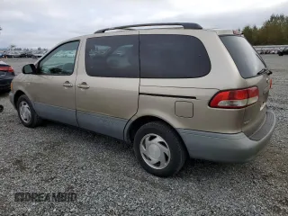 2001 Toyota Sienna LE with VIN 4T3ZF13C11U382702, listed as a Copart auction lot 71856214 with 220,475 mi miles and Clean Title. Bid and sale history available at carsss.com. Image 2.