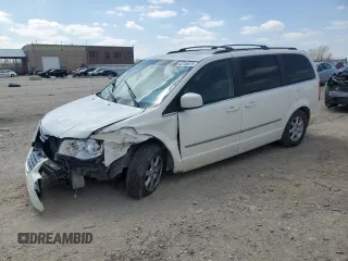 2010 Chrysler Town & Country Touring with VIN 2A4RR5D14AR260321, listed as a Copart auction lot 52700615 with 214,498 mi miles and Salvage Title. Bid and sale history available at DreamBid. Image 1.