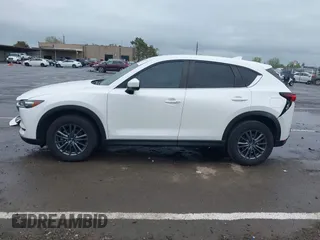 2020 Mazda CX-5 Touring with VIN JM3KFACM0L0738615, listed as a IAAI auction lot 41923923 with 52,599 mi miles. Bid and sale history available at carsss.com. Image 15.