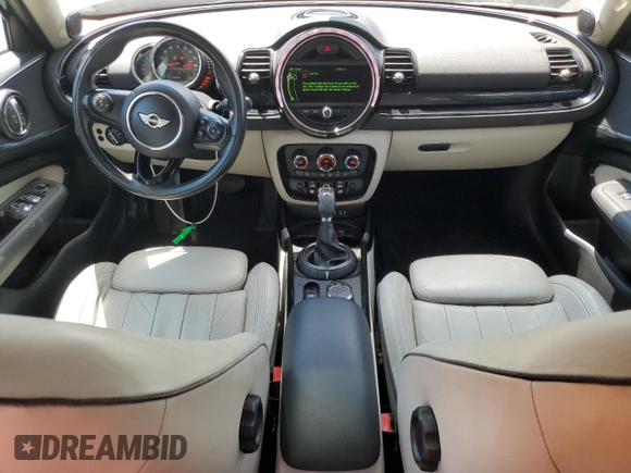 2016 MINI Clubman z VIN WMWLN5C5XG2E29275, wystawiony jako Copart lot #68162014 z przebiegiem 79 754 mil mil oraz Nie do naprawy. Historia ofert i sprzedaży dostępna na DreamBid. Obrazek 8.