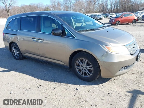 2012 Honda Odyssey EX-L with VIN 5FNRL5H63CB016526, listed as a IAAI auction lot 41701396 with 132,016 mi miles and . Bid and sale history available at carsss.com. Image 1.