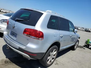 2004 Volkswagen Touareg z VIN WVGCM77L74D059969, wystawiony jako Copart lot #68238193 z przebiegiem Nie podano mil oraz Szkody całkowita. Historia ofert i sprzedaży dostępna na DreamBid. Obrazek 3.