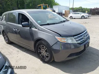 2012 Honda Odyssey EX-L with VIN 5FNRL5H63CB037697, listed as a IAAI auction lot 42262596 with 135,218 mi miles and . Bid and sale history available at DreamBid. Image 1.