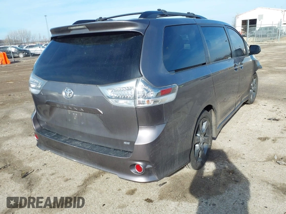2015 Toyota Sienna SE with VIN 5TDXK3DC8FS633124, listed as a IAAI auction lot 41475935 with 182,921 mi miles and . Bid and sale history available at DreamBid. Image 4.