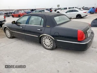 2004 Lincoln Town Car Ultimate z VIN 1LNHM83W14Y660640, wystawiony jako Copart lot #53652685 z przebiegiem 147 781 mil mil oraz Czysty tytuł • Clean title. Historia ofert i sprzedaży dostępna na DreamBid. Obrazek 2.