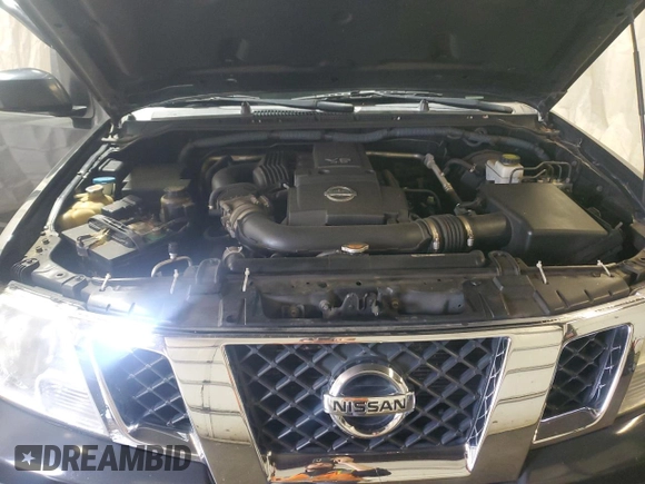 2012 Nissan Frontier Pro-4X with VIN 1N6AD0EV4CC422656, listed as a Copart auction lot 60454985 with 152,535 mi miles and Salvage title. Bid and sale history available at DreamBid. Image 11.