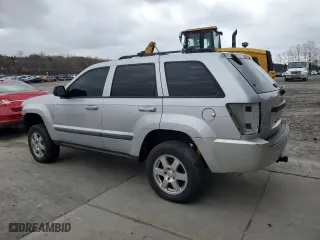 2009 Jeep Grand Cherokee Laredo with VIN 1J8GR48K89C522896, listed as a Copart auction lot 51656265 with 211,359 mi miles and Salvage Title. Bid and sale history available at carsss.com. Image 2.