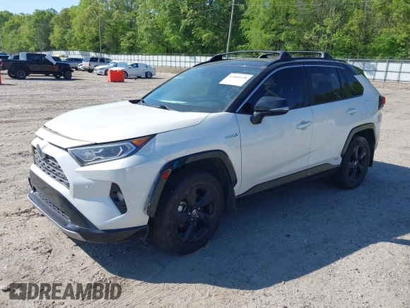 2021 Toyota RAV4 Hybrid XSE with VIN JTME6RFV4MJ008825, listed as a IAAI auction lot 42060148 with 91,129 mi miles and . Bid and sale history available at DreamBid. Image 2.