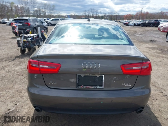2013 Audi A6 Premium Plus z VIN WAUGGAFC1DN038375, wystawiony jako IAAI lot #42051929 z przebiegiem 118 181 mil mil oraz . Historia ofert i sprzedaży dostępna na DreamBid. Obrazek 16.