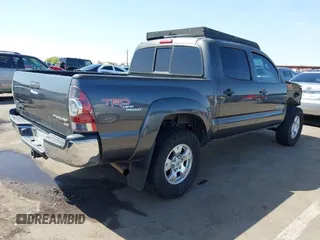 2011 Toyota Tacoma PreRunner with VIN 3TMJU4GN4BM114858, listed as a IAAI auction lot 41976639 with 296,849 mi miles and . Bid and sale history available at DreamBid. Image 4.