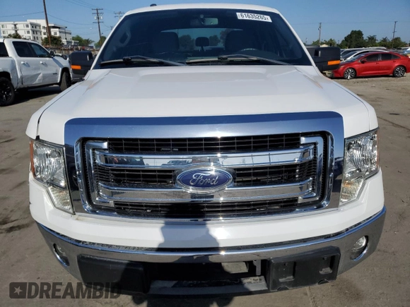 2014 Ford F-150 XL with VIN 1FTFW1CT1EKE22892, listed as a Copart auction lot 61635265 with 14,203 mi miles and Salvage title. Bid and sale history available at DreamBid. Image 5.