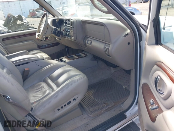 1999 Cadillac Escalade with VIN 1GYEK13R0XR415674, listed as a IAAI auction lot 40003144 with 80,959 mi miles and . Bid and sale history available at DreamBid. Image 5.