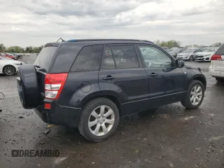 2009 Suzuki Grand Vitara z VIN JS3TE149794100133, wystawiony jako Copart lot #52919795 z przebiegiem 207 928 mil mil oraz Szkoda całkowita • Salvage title. Historia ofert i sprzedaży dostępna na DreamBid. Obrazek 3.