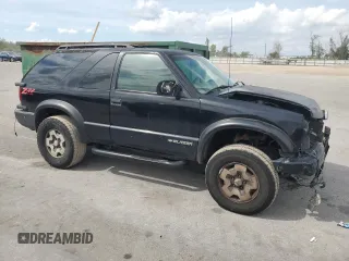 1999 Chevrolet Blazer LS with VIN 1GNCT18W6XK224253, listed as a Copart auction lot 50708405 with 209,711 mi miles and Salvage title. Bid and sale history available at DreamBid. Image 4.