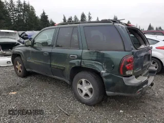 2003 Chevrolet TrailBlazer LTZ with VIN 1GNDT13S332336835, listed as a Copart auction lot 87223954 with 154,435 mi miles and Salvage Title. Bid and sale history available at DreamBid. Image 2.