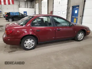 2002 Saturn SL with VIN 1G8ZH52822Z228302, listed as a Copart auction lot 58043985 with 153,058 mi miles and Salvage title. Bid and sale history available at DreamBid. Image 3.