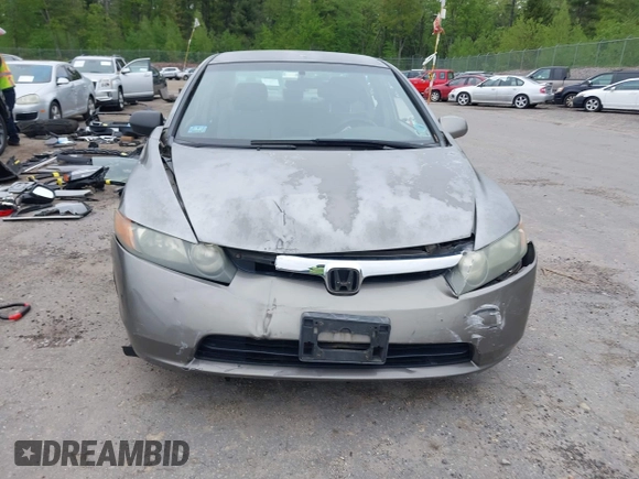 2006 Honda Civic LX z VIN 2HGFA165X6H525119, wystawiony jako IAAI lot #42314196 z przebiegiem 121 752 mil mil oraz . Historia ofert i sprzedaży dostępna na DreamBid. Obrazek 13.