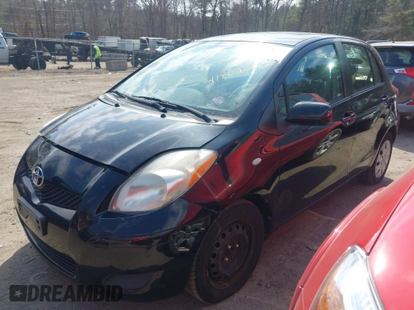2010 Toyota Yaris with VIN JTDKT4K38A5318130, listed as a IAAI auction lot 41802640 with 196,330 mi miles. Bid and sale history available at carsss.com. Image 2.