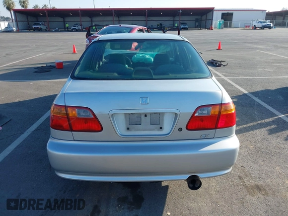 1999 Honda Civic EX with VIN JHMEJ8648XS000823, listed as a IAAI auction lot 41479594 with 299,294 mi miles. Bid and sale history available at carsss.com. Image 17.