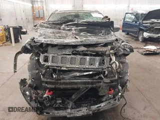 2018 Jeep Compass Trailhawk with VIN 3C4NJDDB2JT211775, listed as a IAAI auction lot 41610112 with 99,238 mi miles and . Bid and sale history available at DreamBid. Image 13.