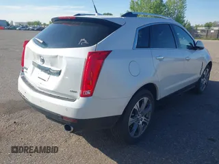 2012 Cadillac SRX Performance Collection z VIN 3GYFNEE30CS652829, wystawiony jako IAAI lot #42156961 z przebiegiem 106 473 mil mil oraz . Historia ofert i sprzedaży dostępna na DreamBid. Obrazek 4.
