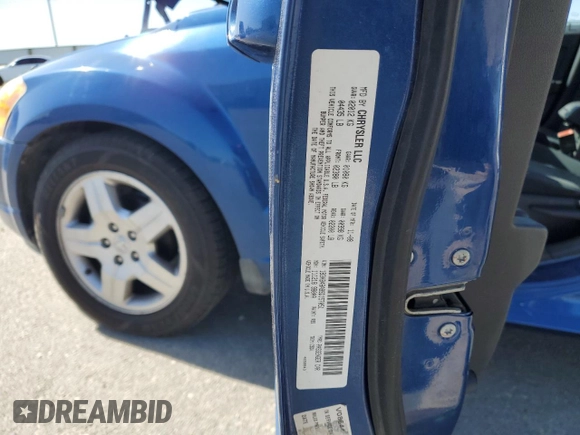 2009 Dodge Caliber SXT with VIN 1B3HB48A99D157051, listed as a Copart auction lot 52098965 with 188,268 mi miles and Salvage Title. Bid and sale history available at carsss.com. Image 14.