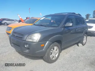 2007 Hyundai Tucson SE with VIN KM8JN12DX7U635740, listed as a IAAI auction lot 41648027 with 169,967 mi miles. Bid and sale history available at carsss.com. Image 2.