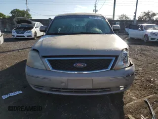 2006 Ford Five Hundred SE with VIN 1FAFP23146G150866, listed as a Copart auction lot 77141084 with 233,540 mi miles and Salvage Title. Bid and sale history available at carsss.com. Image 5.