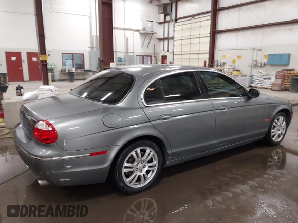 2005 Jaguar S-Type with VIN SAJWA01T85FN43991, listed as a IAAI auction lot 42055271 with 114,454 mi miles and . Bid and sale history available at DreamBid. Image 4.