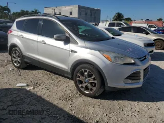 2013 Ford Escape SEL with VIN 1FMCU9H95DUA01616, listed as a Copart auction lot 42802765 with 257,952 mi miles and Salvage Title. Bid and sale history available at DreamBid. Image 4.
