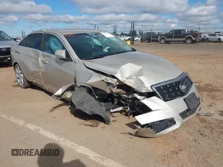 2014 Cadillac ATS Standard RWD with VIN 1G6AA5RX3E0129469, listed as a IAAI auction lot 41934275 with 95,653 mi miles. Bid and sale history available at carsss.com. Image 1.